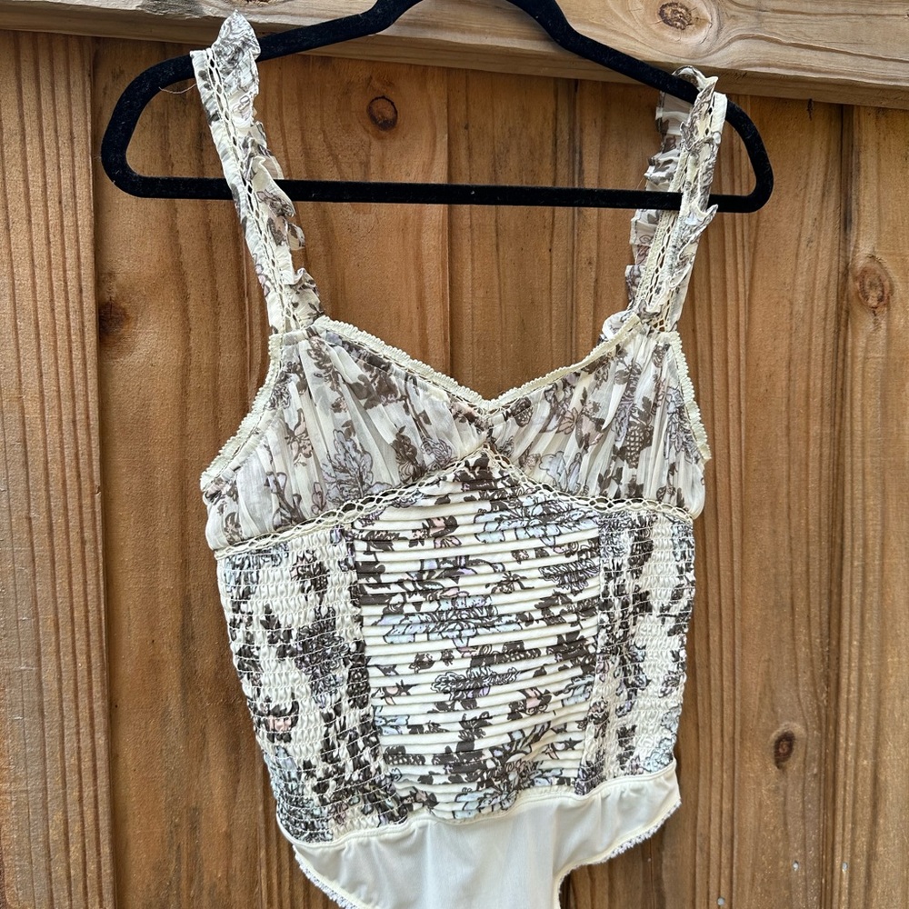 Free People Bodysuit with the perfect scrunch shoulder and beautiful detail